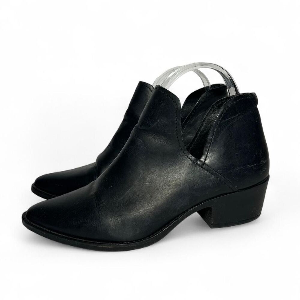Steve Madden Black ankle booties with a pointed toe and open sides